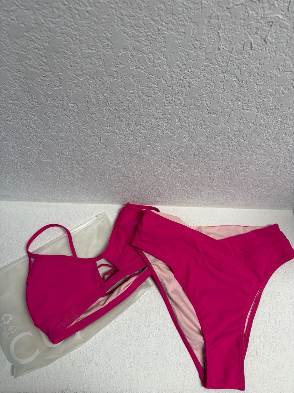 NWT Fuchsia Pink Strappy Bikini Set M
Keyhole top and high waist crossover